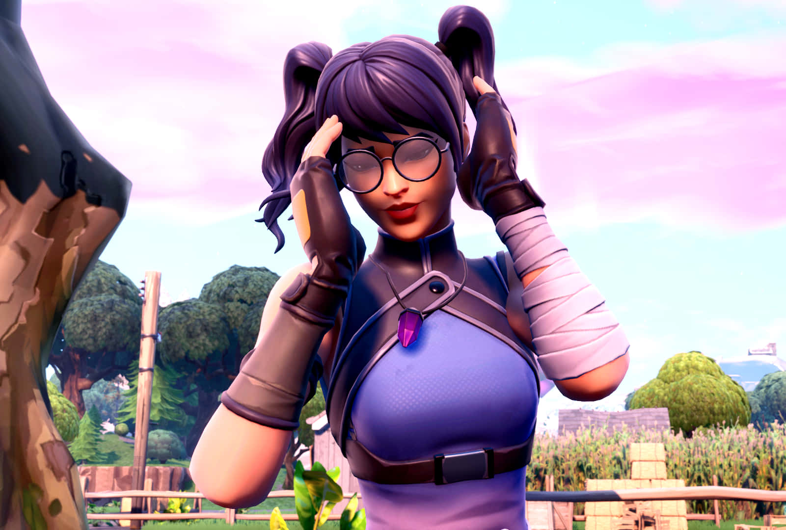 桌布 壁紙 — 一個擁有紫色雙馬尾和眼鏡的Fortnite角色在充滿活力的戶外環境中整理頭髮。