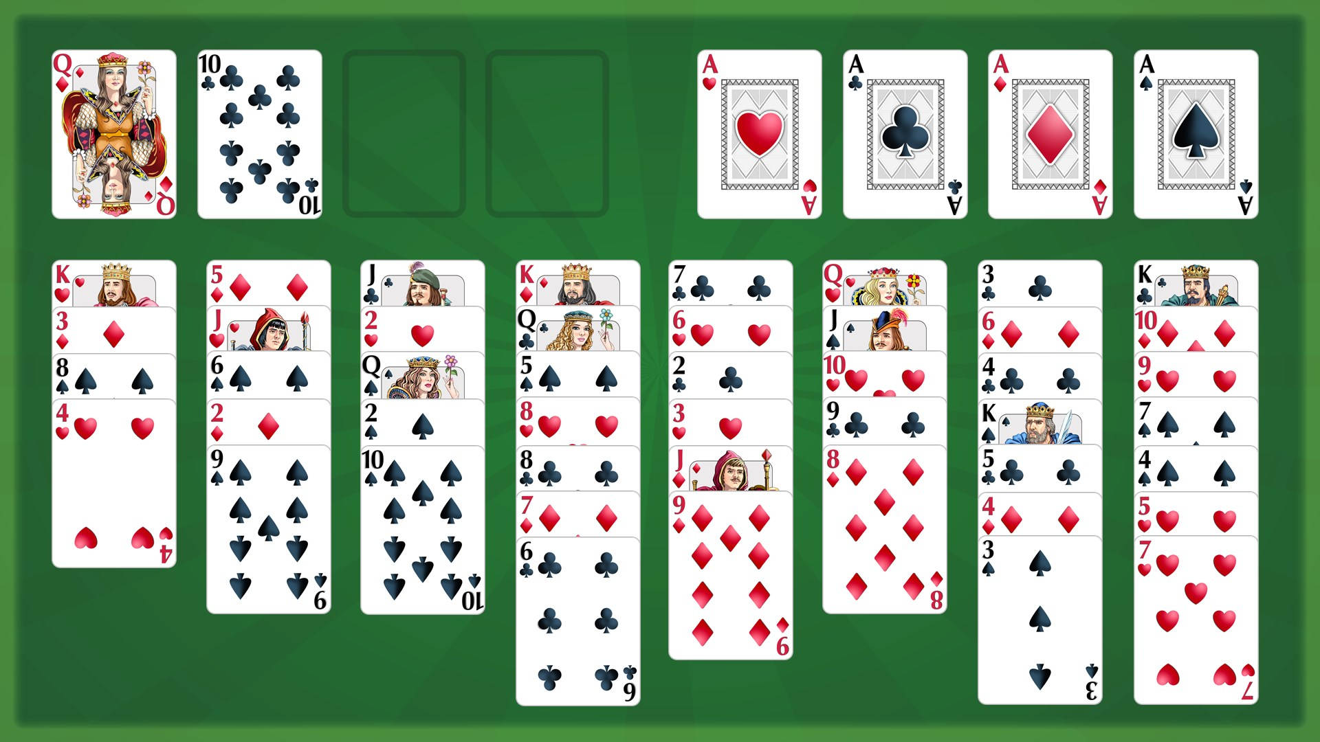 數位接龍卡牌遊戲，卡片排列在綠色毛氈桌上。 — Microsoft 壁紙