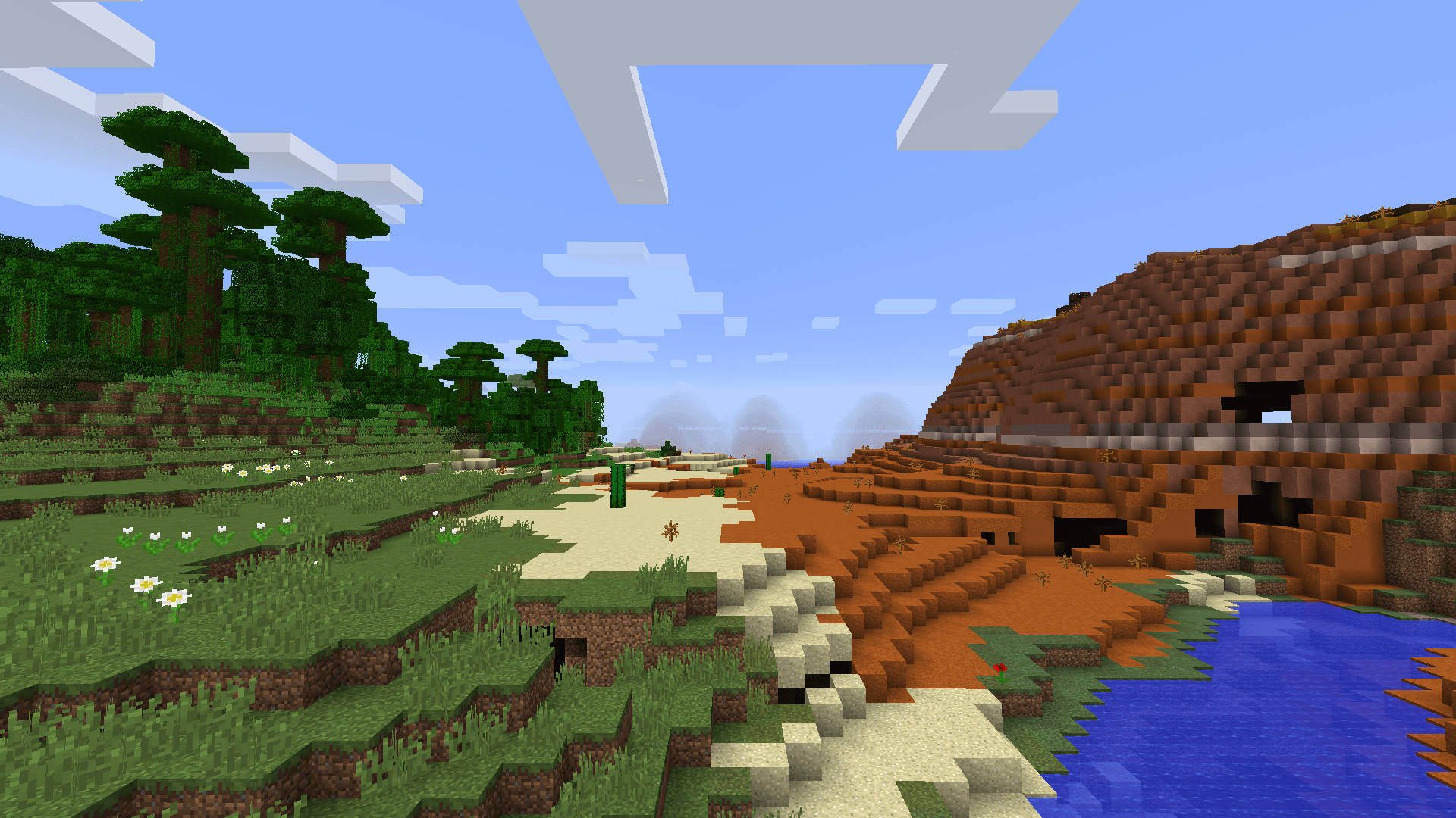 Minecraft Aesthetic 桌布 壁紙 — 一個方塊狀的Minecraft景觀，有綠樹、草、花、河流和山脈，在藍天白雲下。