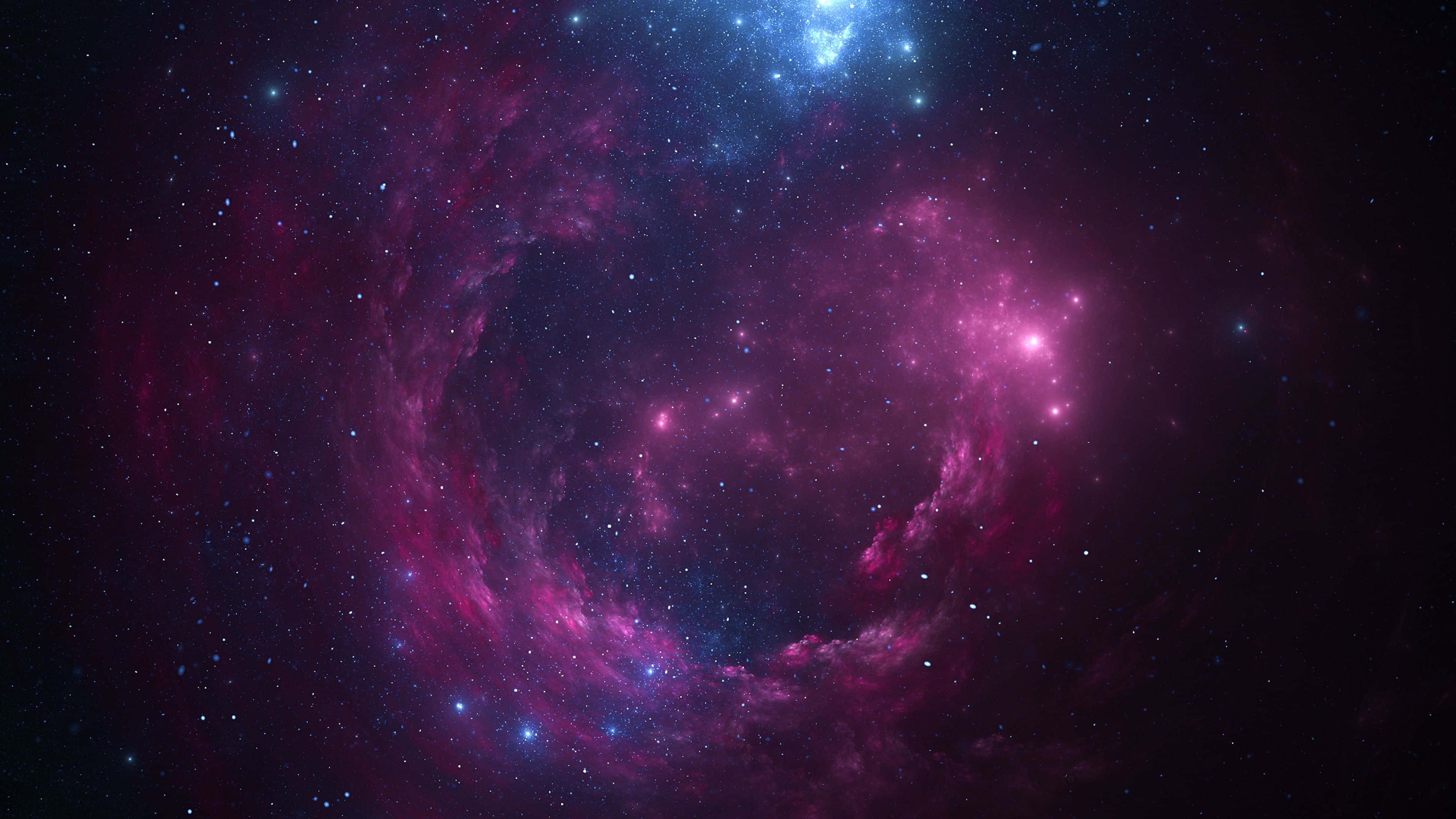 外太空 桌布 壁紙 — 一個旋轉的宇宙星雲在佈滿星星的黑色虛空中散發出充滿活力的洋紅色和電光藍色光芒。