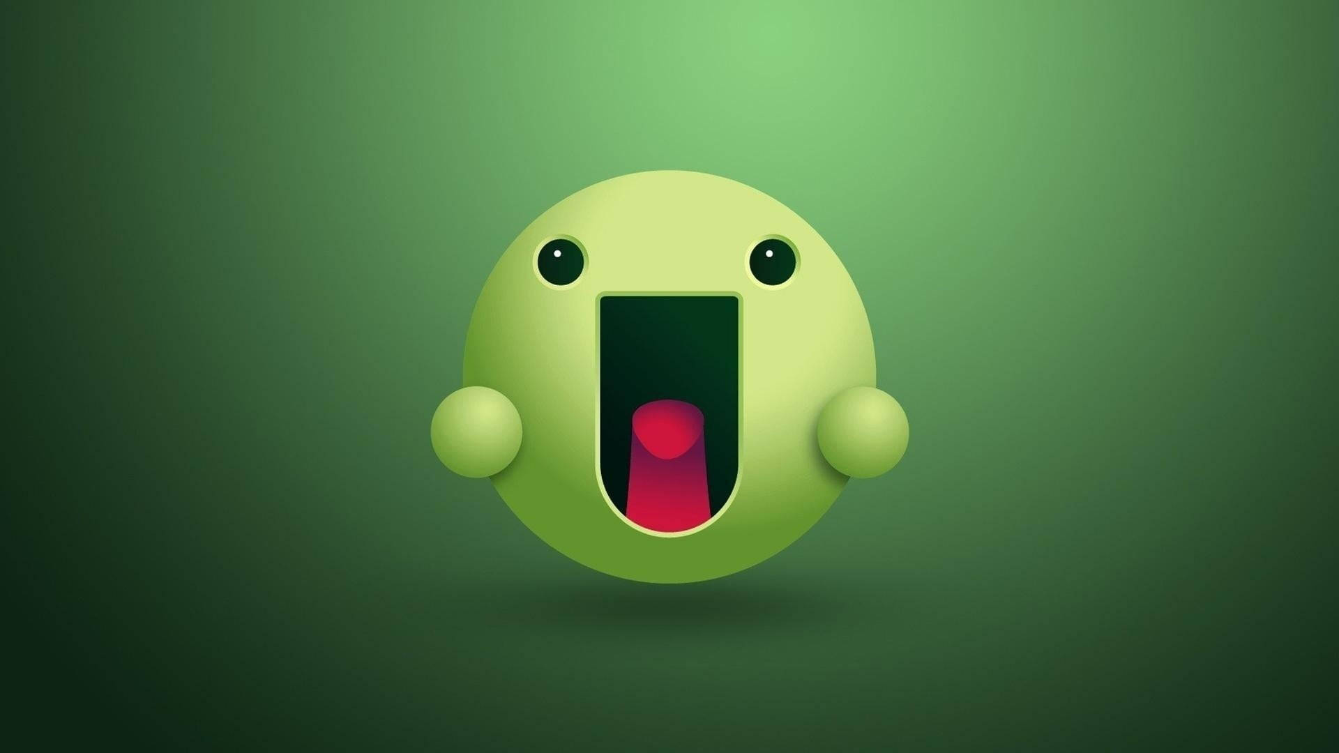 Android Desktop 桌布 壁紙 — 一個明亮的綠色3D渲染表情符號，睜大眼睛，張開嘴巴，露出粉紅色的舌頭，背景是漸變綠色。