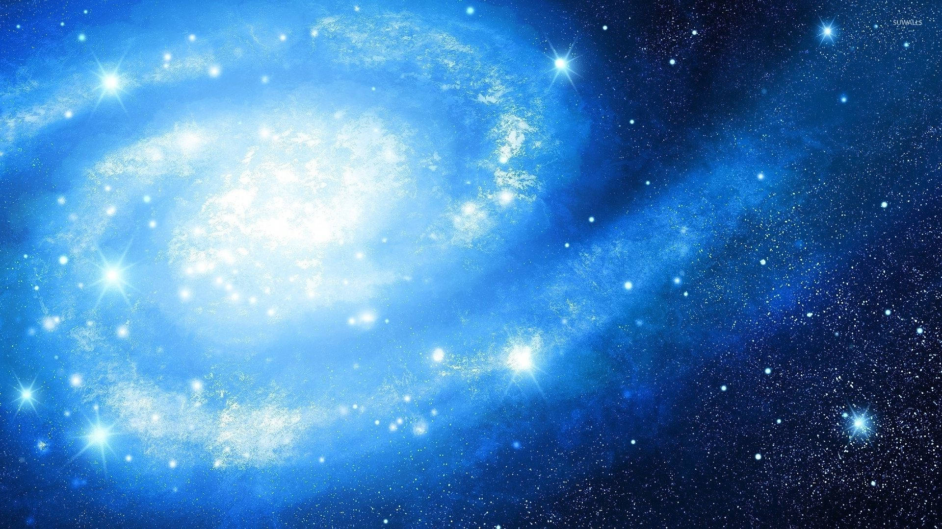 銀河 桌布 壁紙 — 一個明亮的藍色螺旋星系在深邃的宇宙背景下散發出明亮的星星。