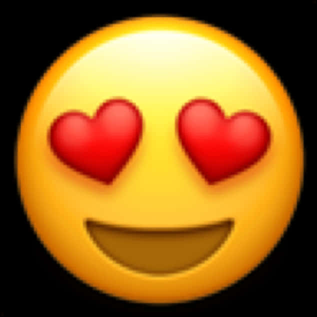 Love Emoji 桌布 壁紙 — 一個明亮的黃色表情符號臉，帶有紅色心形眼睛和寬闊的笑容，背景為黑色。