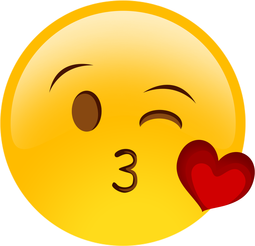 Emoticon 桌布 壁紙 — 一個明亮的黃色表情符號臉眨眼並在柔和藍色背景上向紅色愛心旁邊送飛吻。