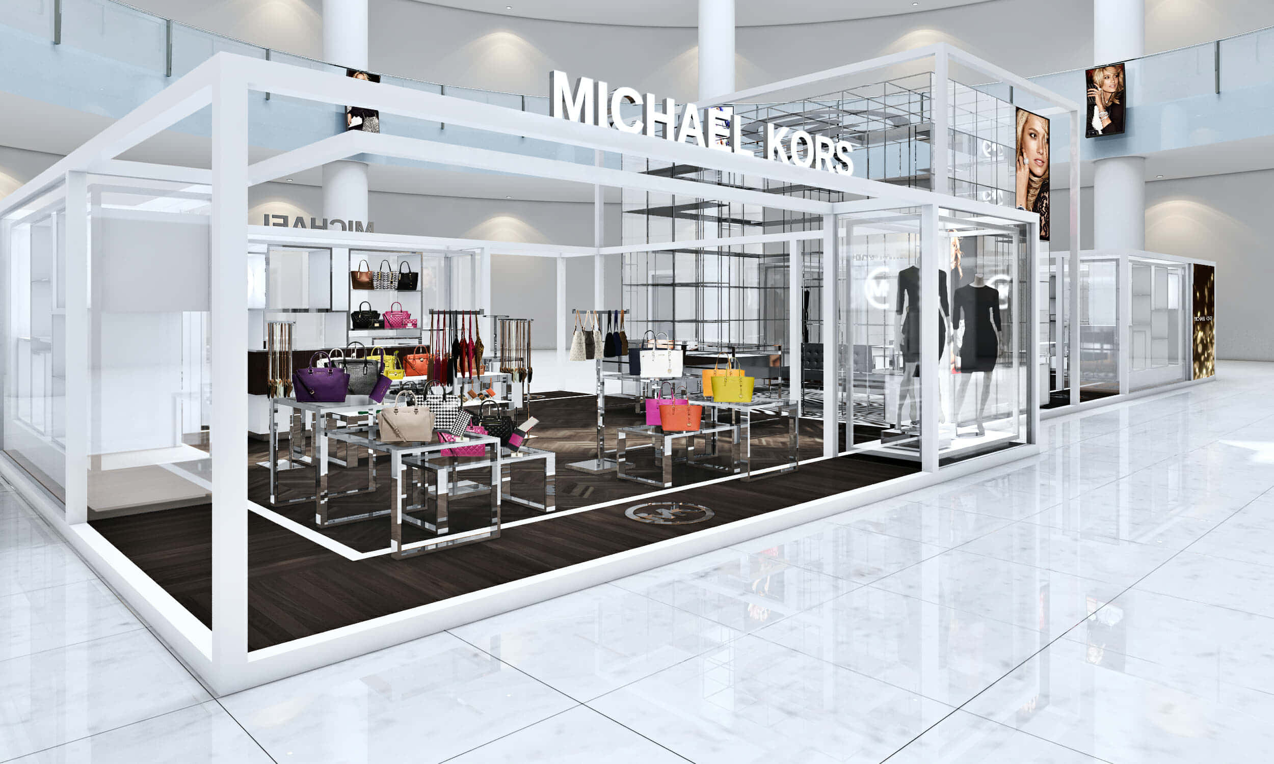 麥可·寇斯 桌布 壁紙 — 一個時尚現代的Michael Kors零售亭，玻璃牆內展示色彩繽紛的手袋和衣服，放在光亮的購物中心內的鉻合金架上。