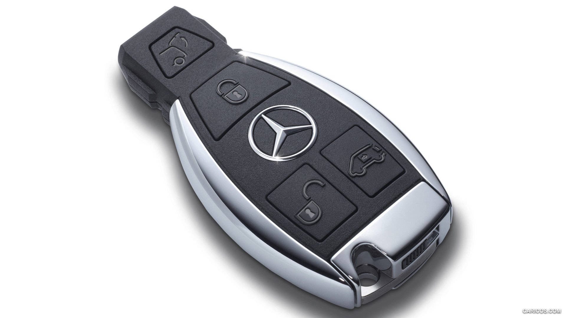 key 桌布 壁紙 — 一個時尚的 Mercedes-Benz 車鑰匙，帶有鍍鉻裝飾和黑色按鈕，孤立在白色背景上。