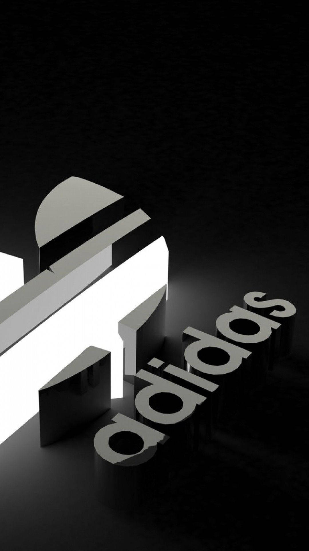 3D iPhone 壁紙 桌布 壁紙 — 一個時尚的3D渲染adidas標誌，帶有醒目的白色和黑色幾何形狀，在深色表面上投射出銳利的陰影。