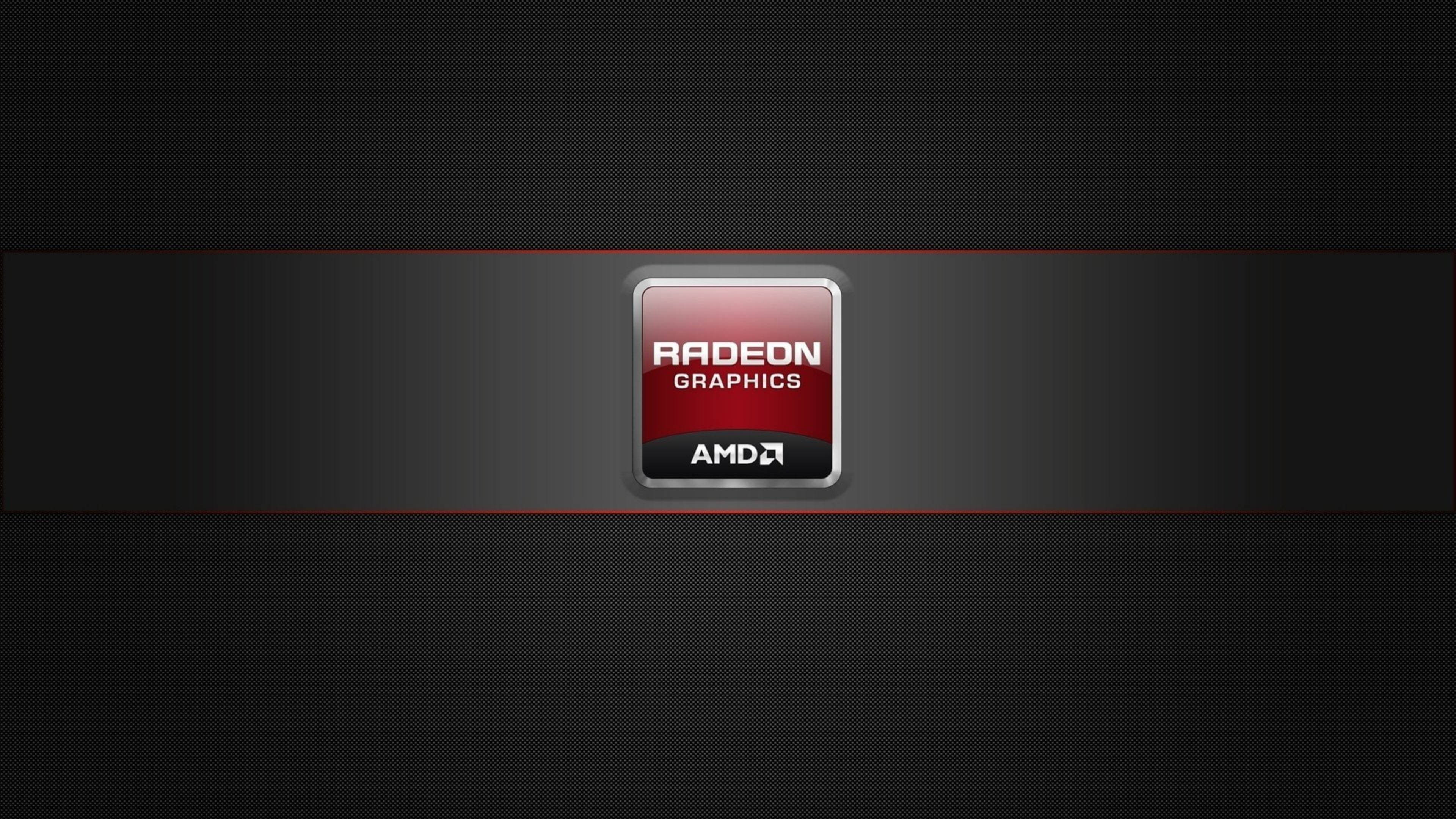 4K 桌布 壁紙 — 一個時尚的AMD Radeon Graphics標誌，居中放置在帶有紅色強調線條的深色紋理背景上。