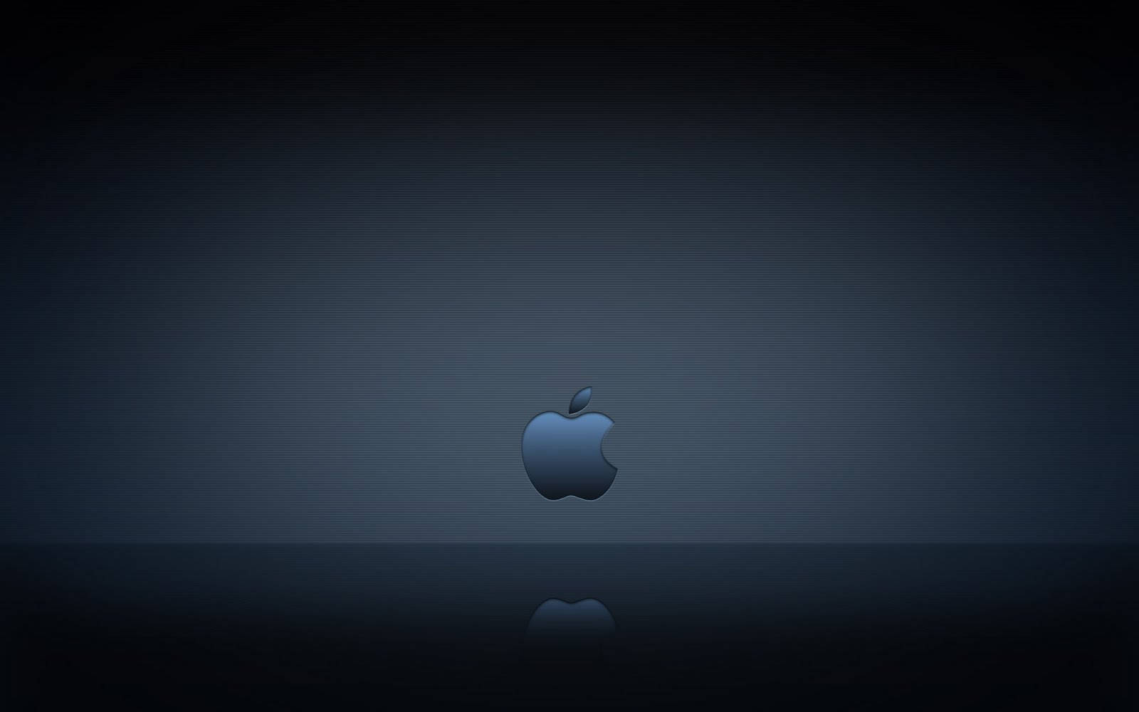 桌布 壁紙 — 一個時尚的Apple標誌在深色漸變背景上柔和發光，下方有微妙的倒影。