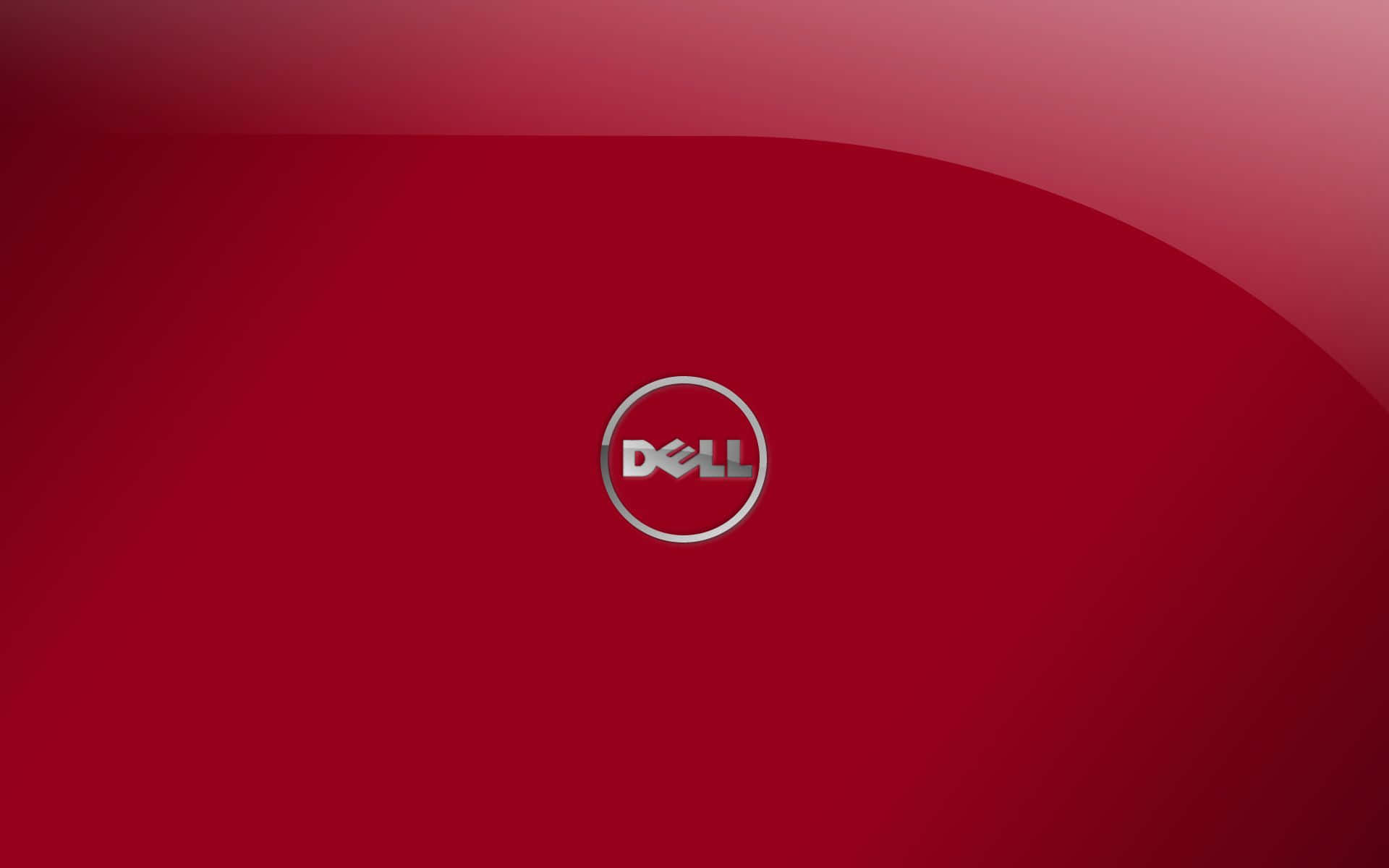Dell 桌布 壁紙 — 一個時尚的Dell標誌居中於漸變紅色背景上，帶有柔和燈光效果。