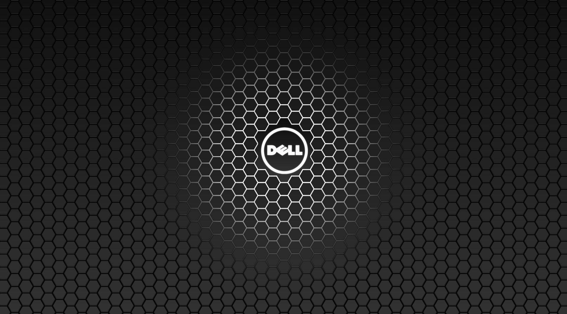 Dell Laptop 桌布 壁紙 — 一個時尚的Dell標誌置於深色六邊形網格圖案中央，帶有發光的徑向漸變效果。