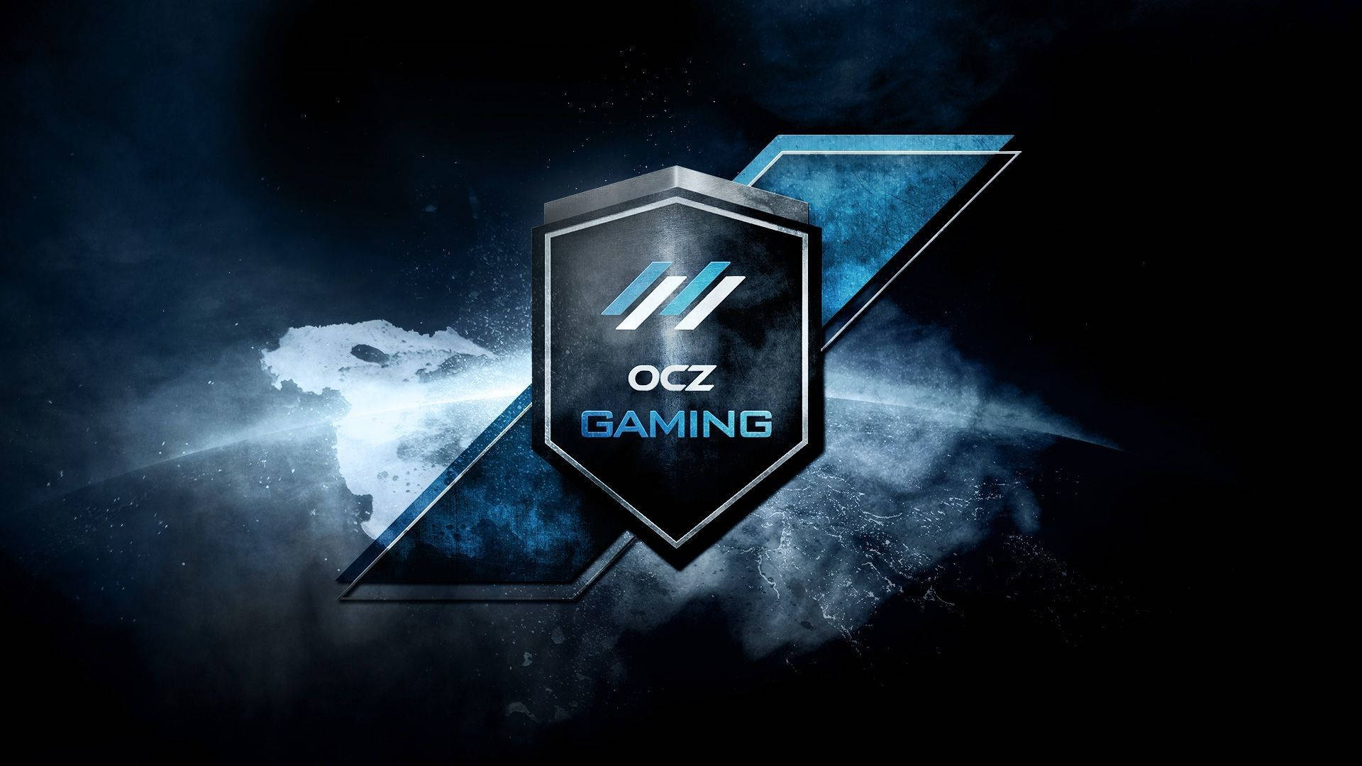 Profile 桌布 壁紙 — 一個時尚的OCZ Gaming標誌盾牌在黑暗的宇宙背景中，伴隨著旋轉的星雲和破碎玻璃效果，發出藍光。