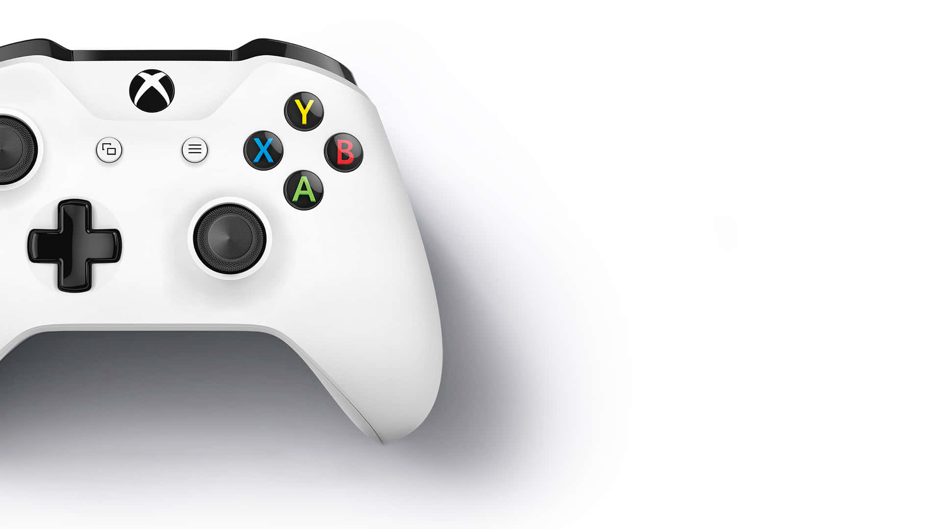 Xbox 桌布 壁紙 — 一個時尚的白色Xbox控制器，帶有彩色按鈕，靠在極簡的白色背景上。