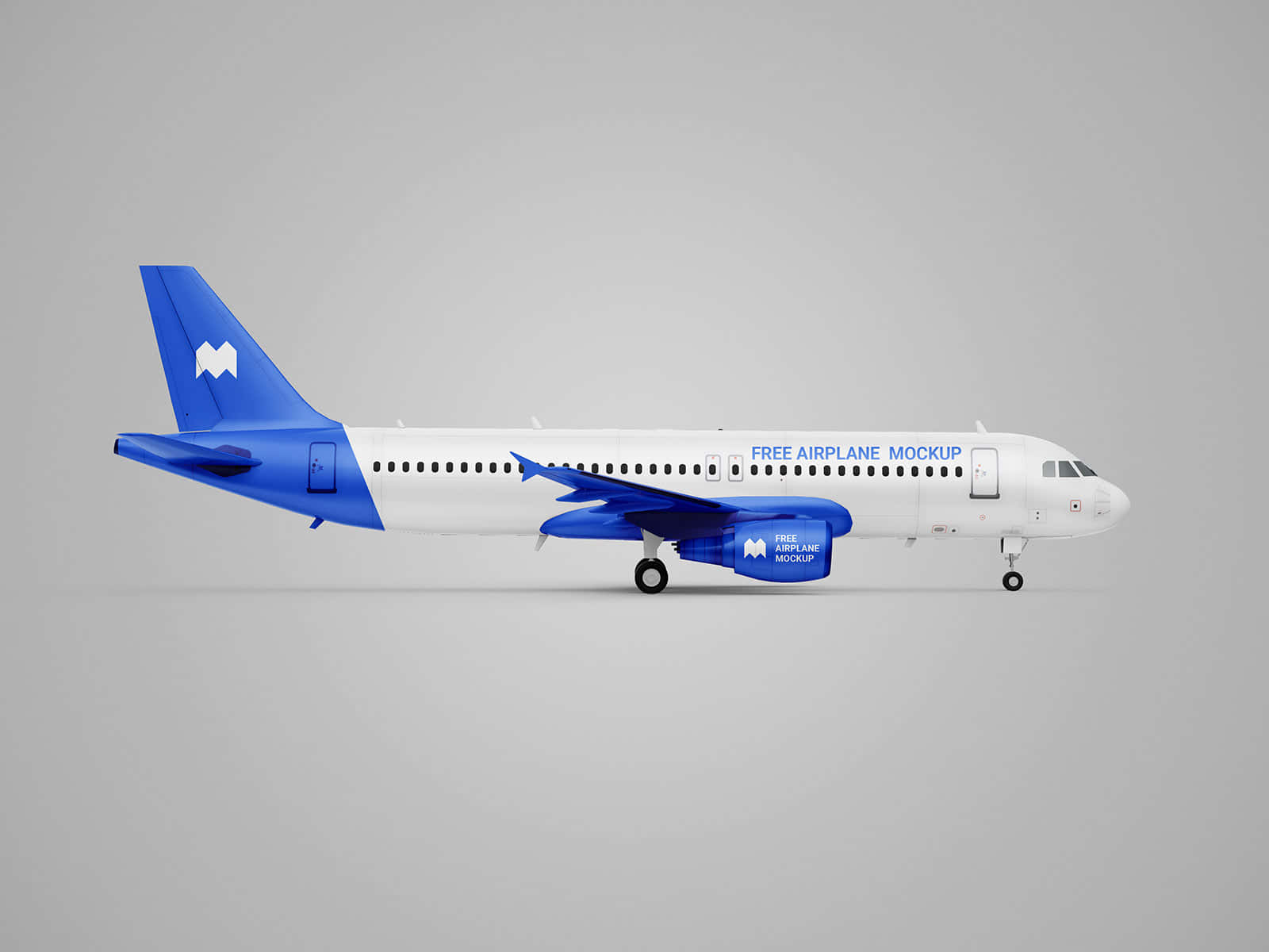 飛機 桌布 壁紙 — 一個時尚的白色和藍色飛機模型，上面有「FREE AIRPLANE MOCKUP」文字，放置在純灰色工作室地板上。