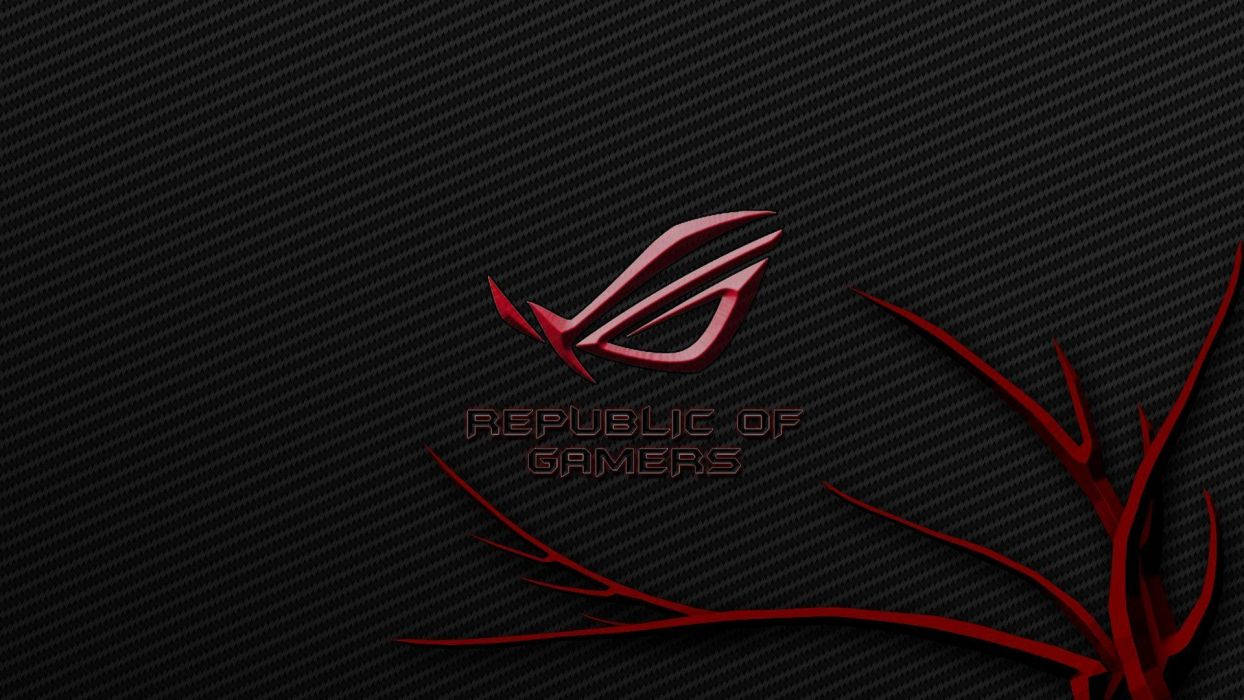 華碩 ROG 桌布 壁紙 — 一個時尚的紅色 ROG 標誌和文字漂浮在風格化的紅色樹枝上，背景是黑色碳纖維紋理。