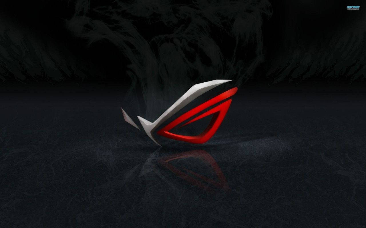 華碩 ROG 桌布 壁紙 — 一個時尚的紅色和銀色 ROG 標誌放置在深色反光表面上，帶有煙熏黑色背景。