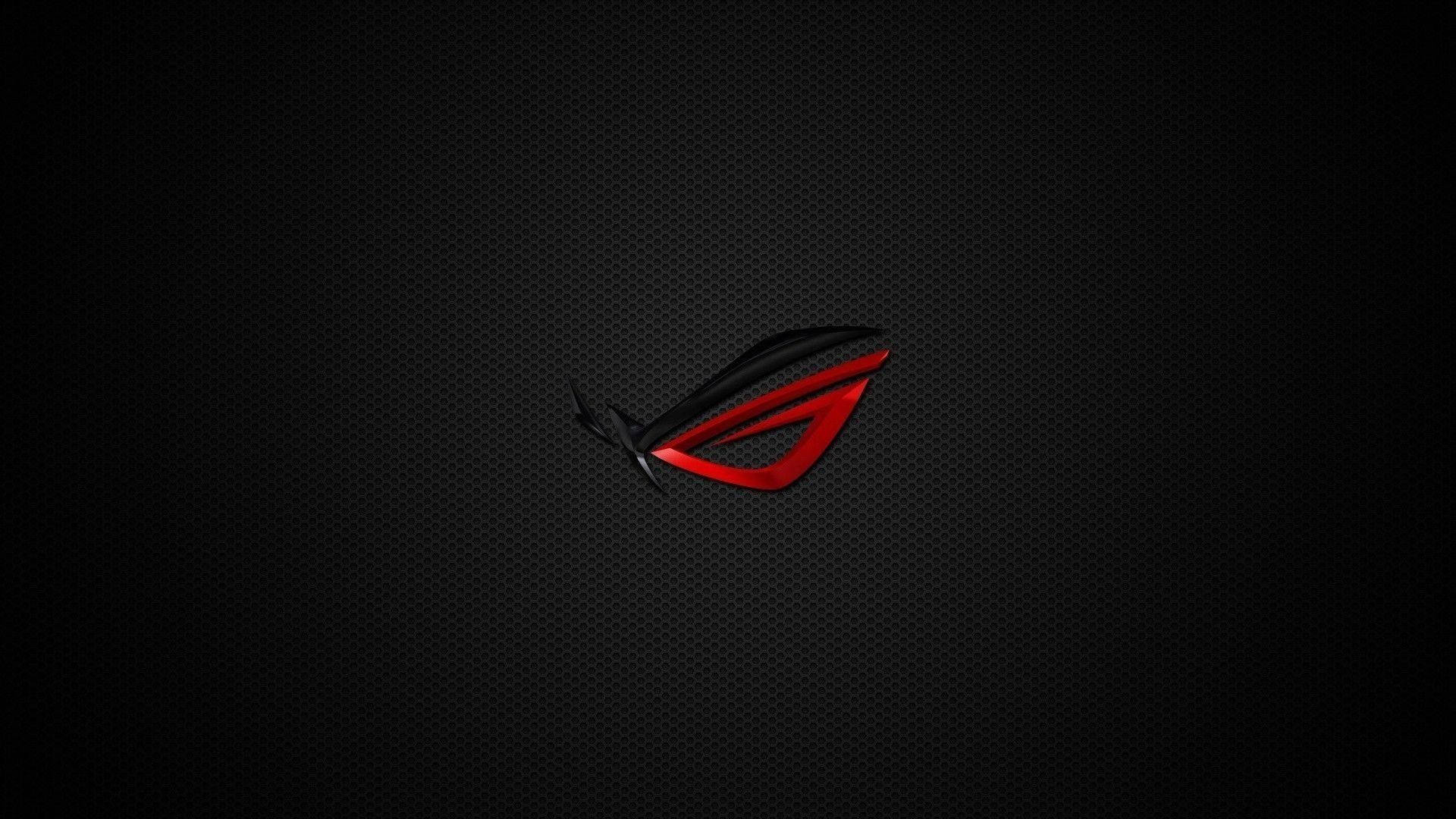 Rog 桌布 壁紙 — 一個時尚的紅黑色ROG標誌在深色紋理背景上發光。