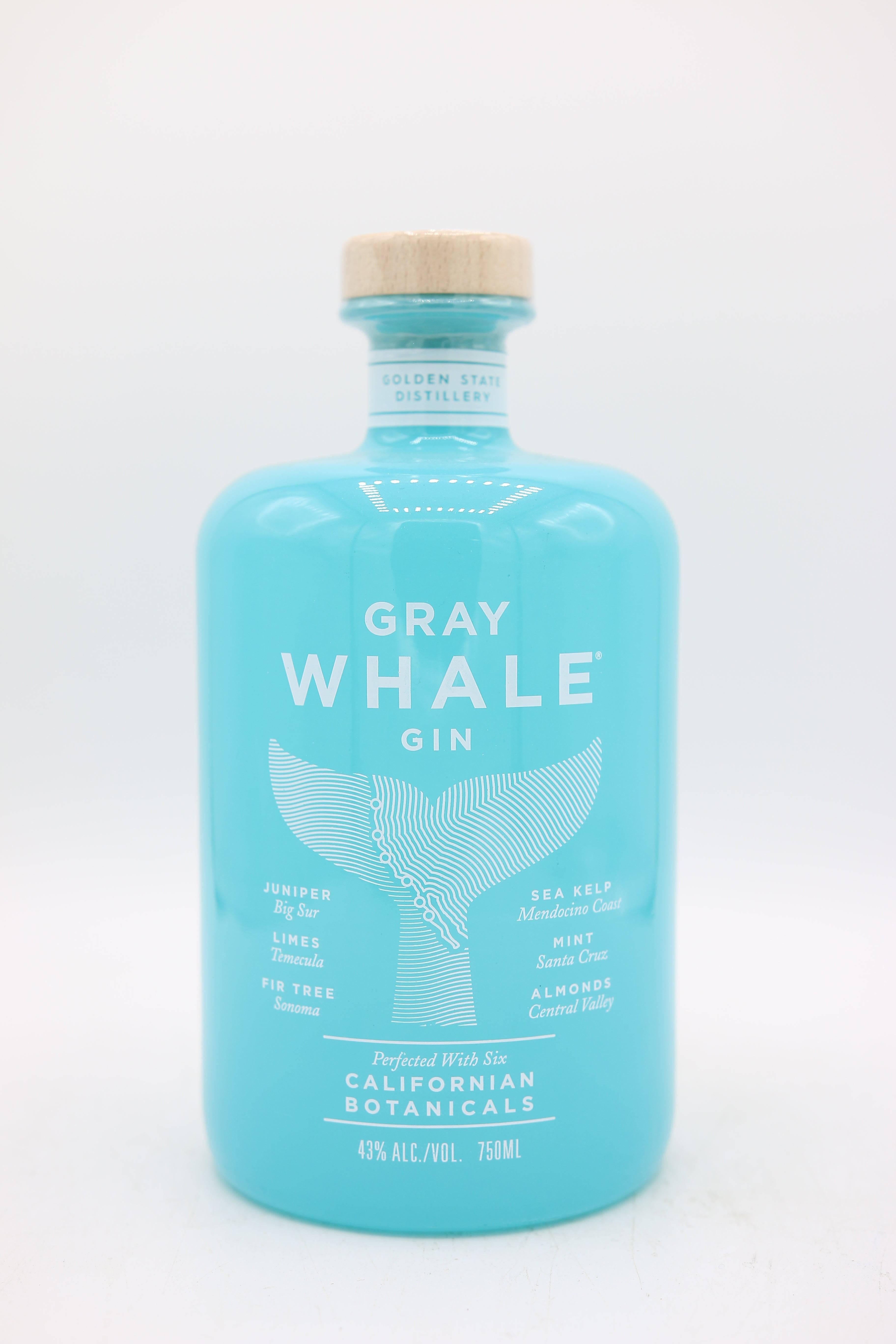 Gin 桌布 壁紙 — 一個時尚的藍綠色琴酒瓶，帶有鯨魚尾巴設計和植物成分列表，背景為潔淨的白色。