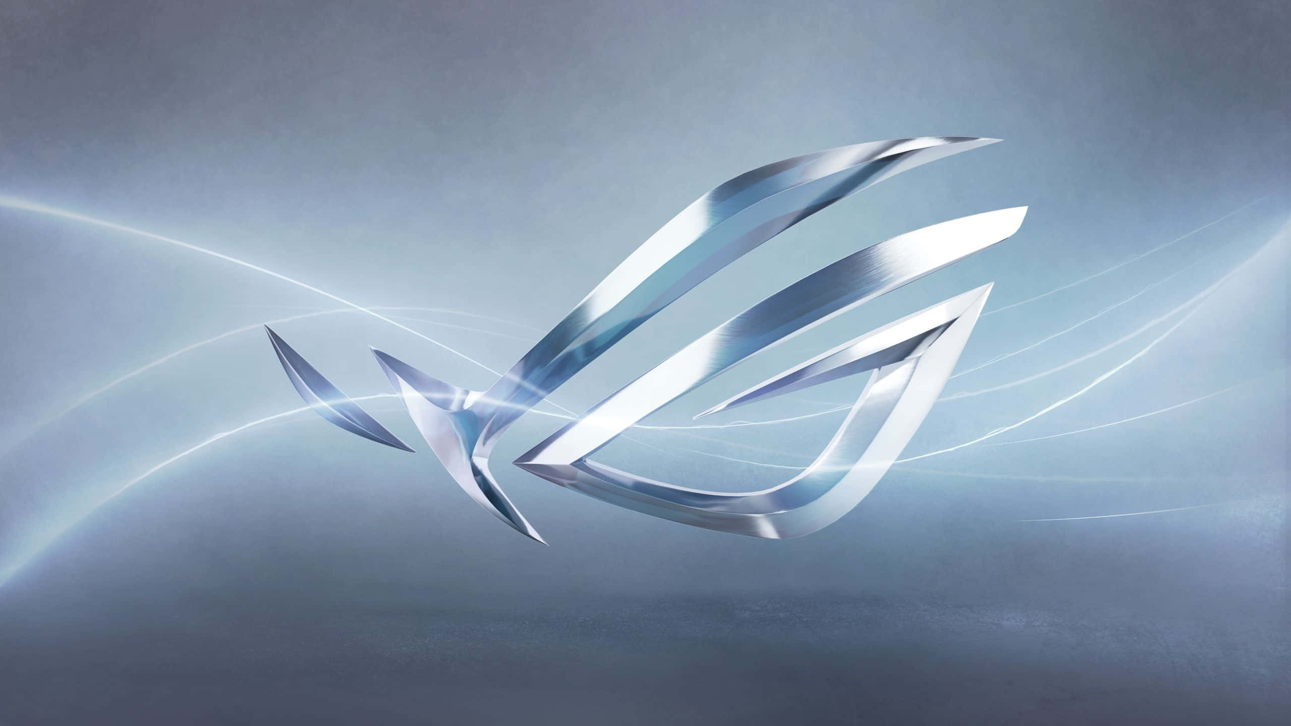 ASUS 桌布 壁紙 — 一個時尚的金屬ROG標誌在清涼的漸變背景上散發出耀眼的光芒。