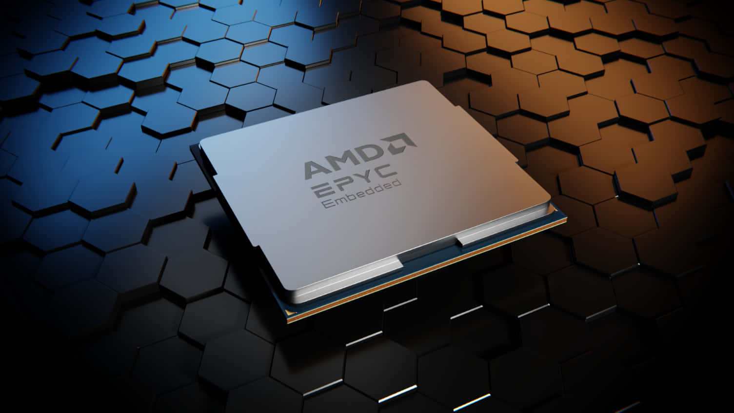 AMD 桌布 壁紙 — 一個時尚的銀色 AMD EPYC Embedded 處理器放置在六角形表面上，在戲劇性的燈光下從藍色過渡到金色。