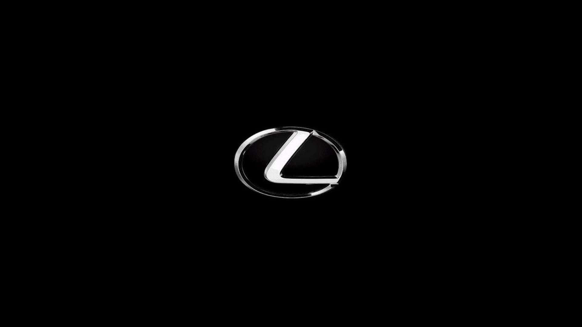標誌 桌布 壁紙 — 一個時尚的銀色 Lexus 標誌在純黑色背景上閃耀，帶有銳利的反射。
