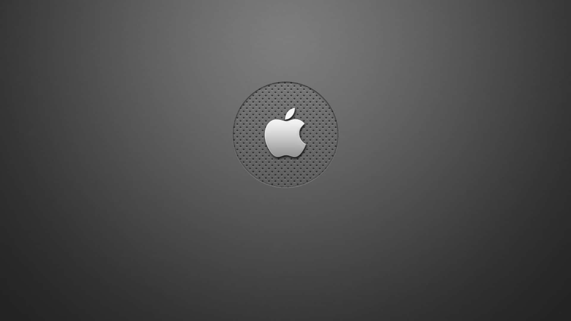 Mesh 桌布 壁紙 — 一個時尚的銀色Apple標誌，位於深灰色穿孔圓形面板中央，背景為漸變色。
