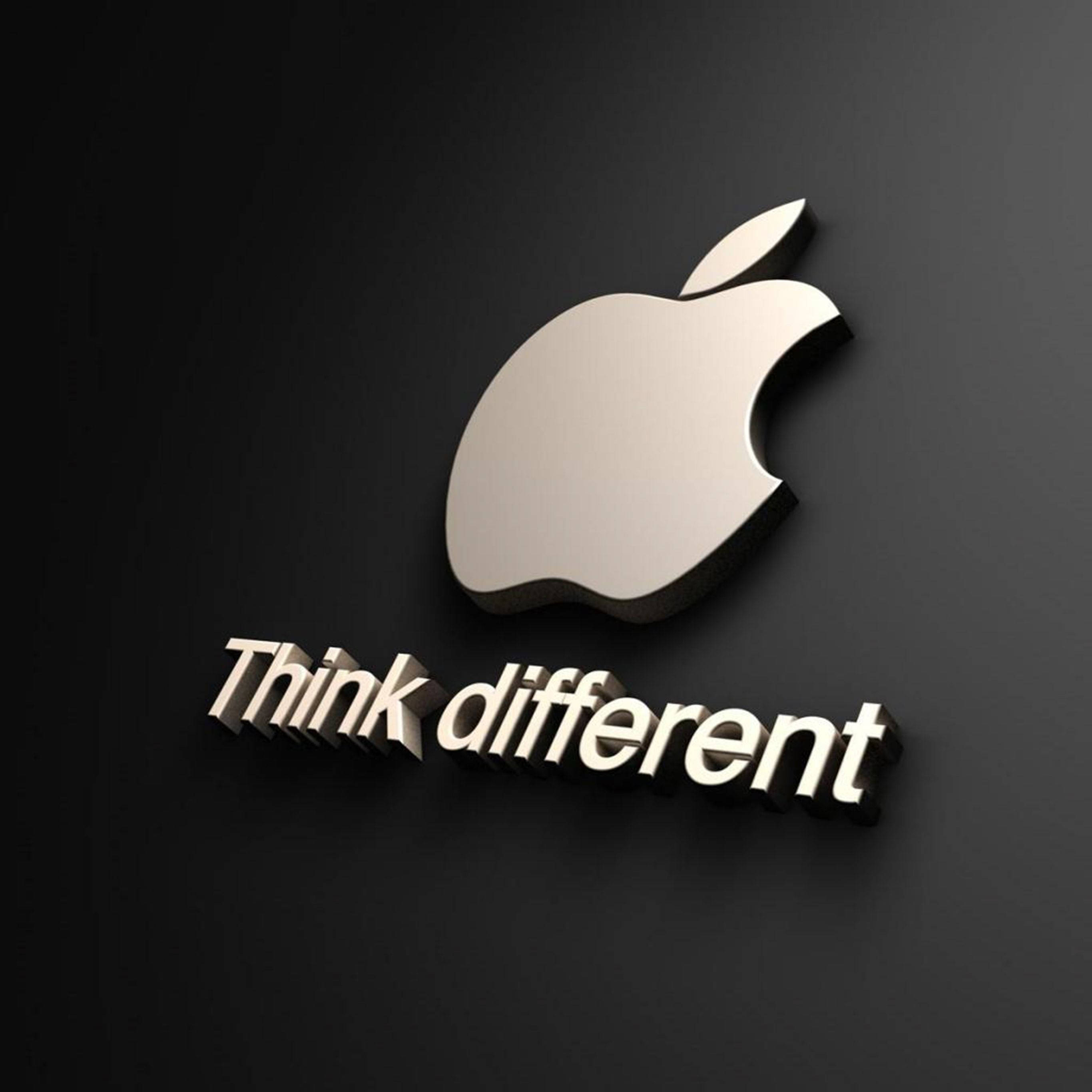 蘋果 桌布 壁紙 — 一個時尚的銀色Apple標誌，帶有「Think different」文字，在磨砂黑色背景上投射出柔和陰影。
