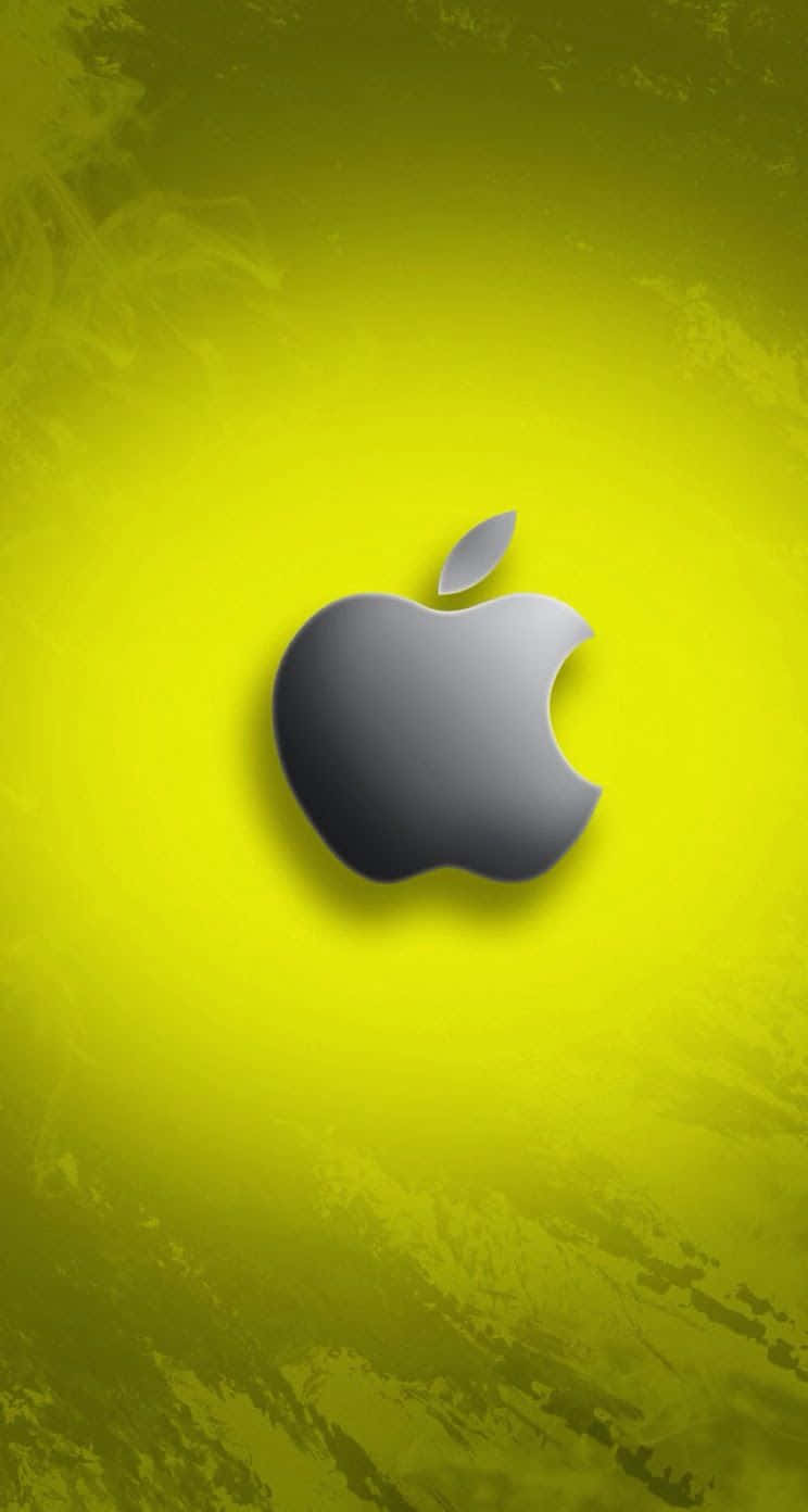 蘋果 桌布 壁紙 — 一個時尚的銀色Apple標誌居中在充滿活力的黃色紋理背景上，帶有漸變照明。