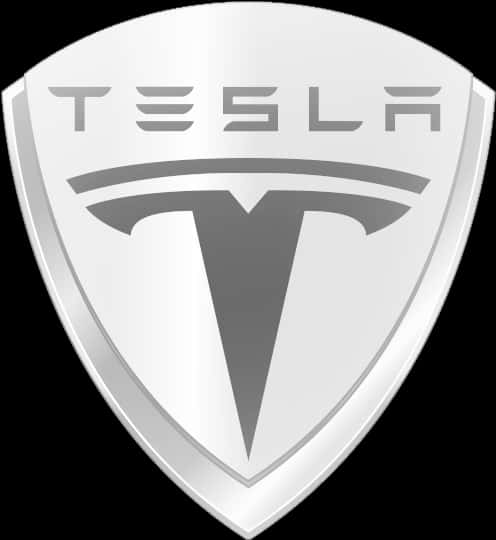 Logos 桌布 壁紙 — 一個時尚的銀色Tesla標誌盾牌徽章，帶有粗體字和風格化的T，背景為黑色。
