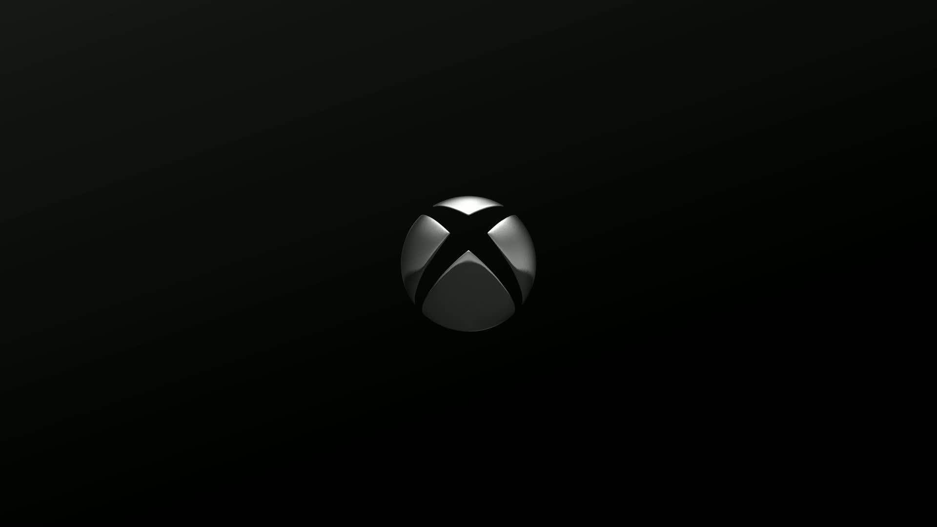 X 桌布 壁紙 — 一個時尚的銀色Xbox標誌，居中放置在漸變黑色背景上，帶有微妙的燈光高光。
