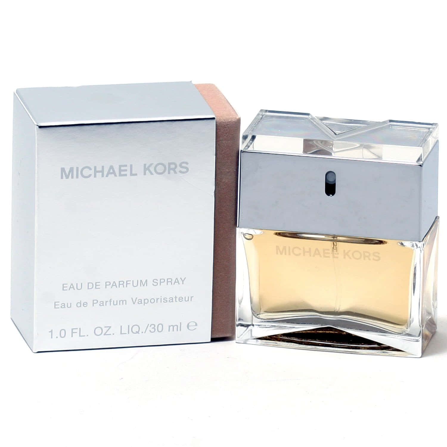 麥可·寇斯 桌布 壁紙 — 一個時尚的銀色和金色Michael Kors香水瓶放在其匹配的盒子旁邊，在乾淨的白色表面上。