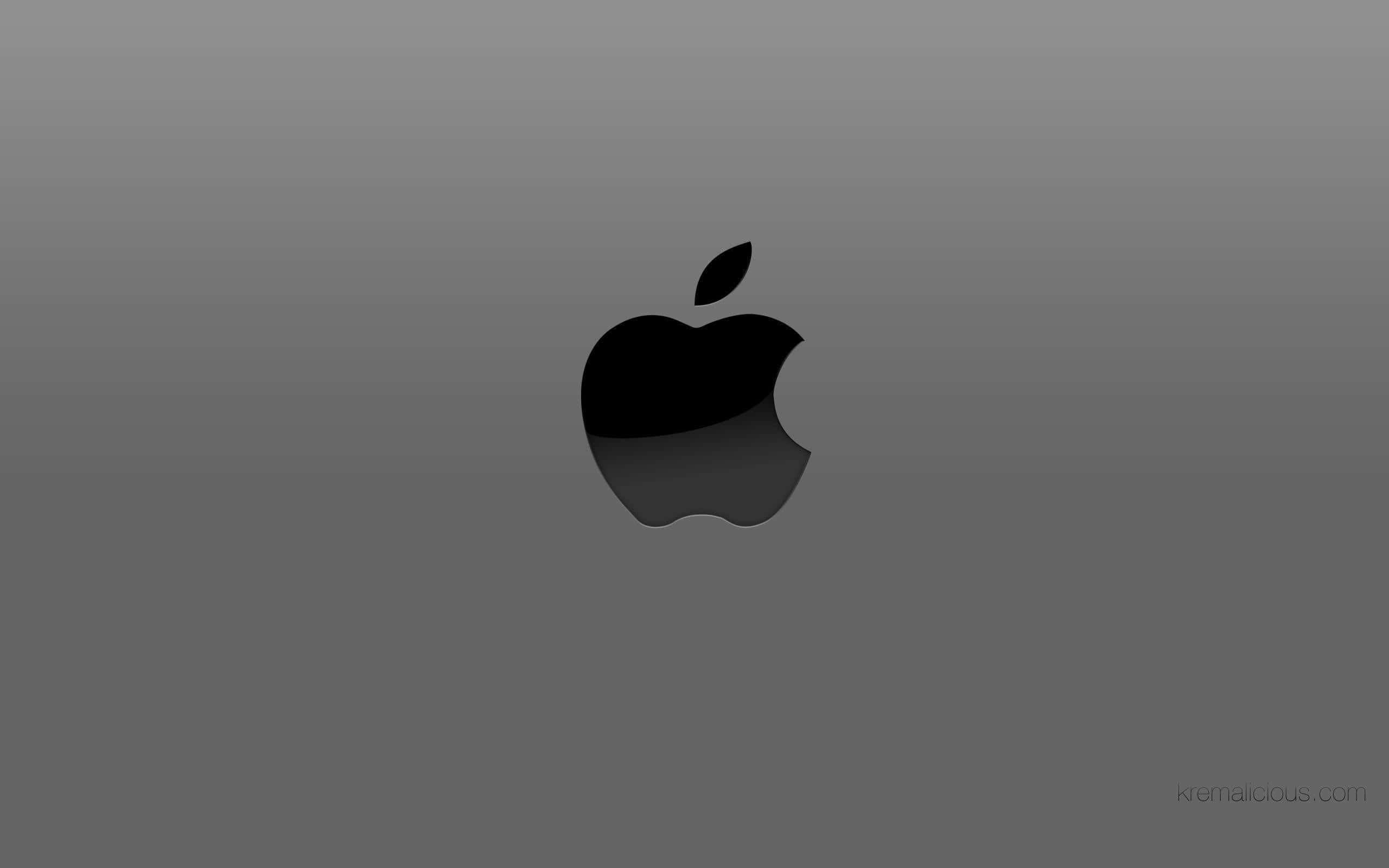 Cool Apple 桌布 壁紙 — 一個時尚的黑色Apple標誌居中於漸變灰色背景上，帶有微妙的反射。