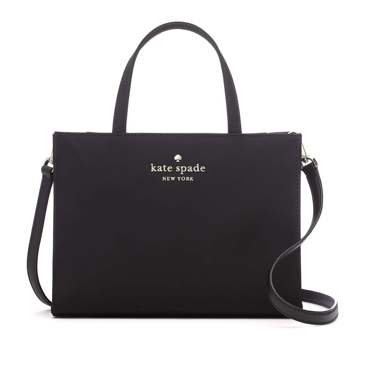 kate spade 桌布 壁紙 — 一個時尚的黑色kate spade new york手提袋，配有頂部手柄和可拆卸肩帶，背景為白色。