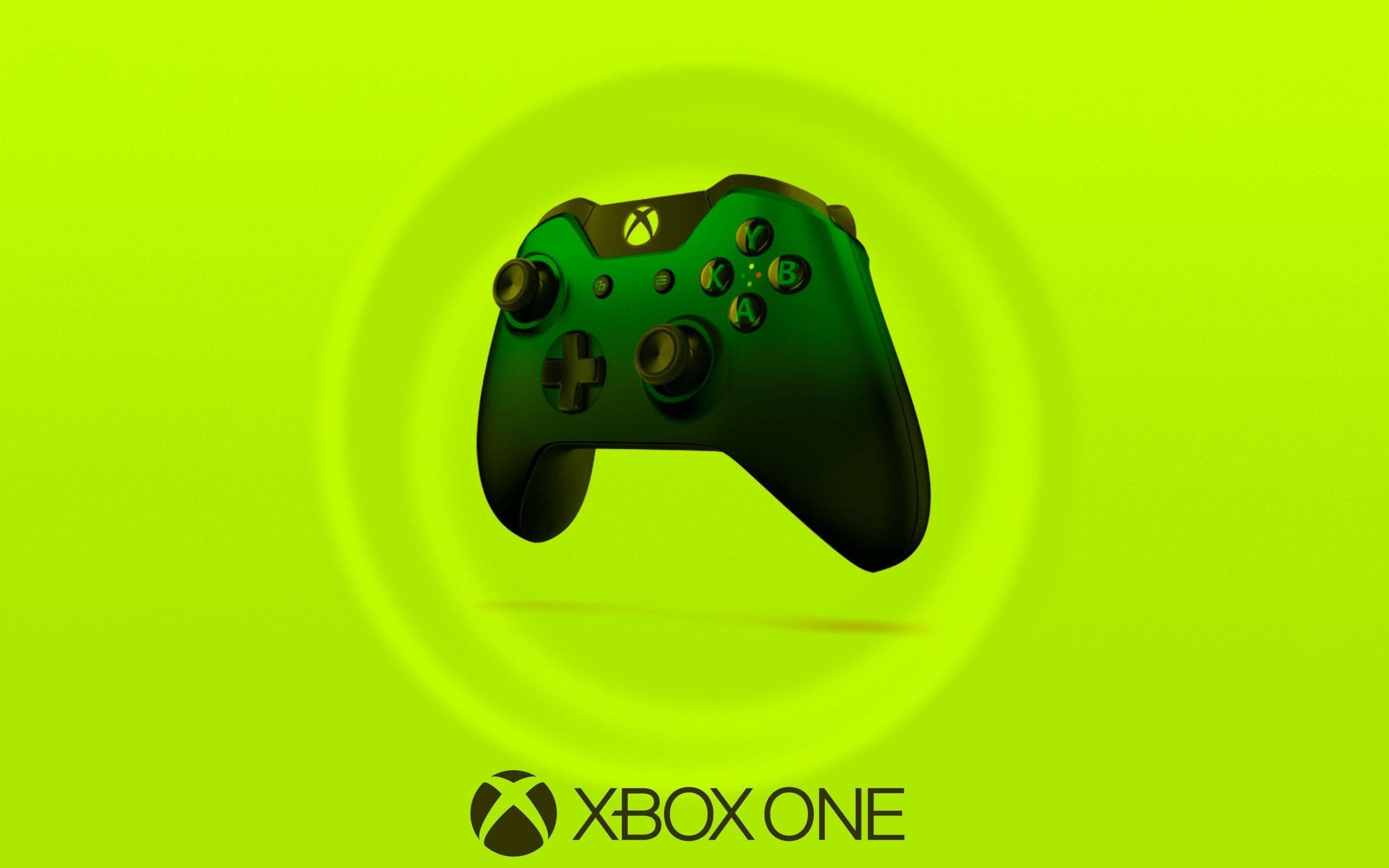 Xbox 桌布 壁紙 — 一個時尚的黑色Xbox One控制器漂浮在充滿活力的萊姆綠色漸變背景上，帶有微妙的圓形光效。