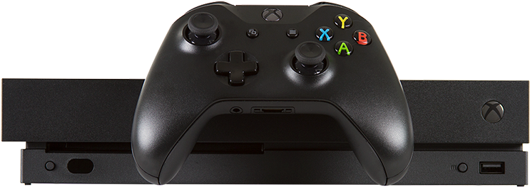 Xbox 桌布 壁紙 — 一個時尚的黑色Xbox手把放在相配的Xbox主機上，背景是純白色。