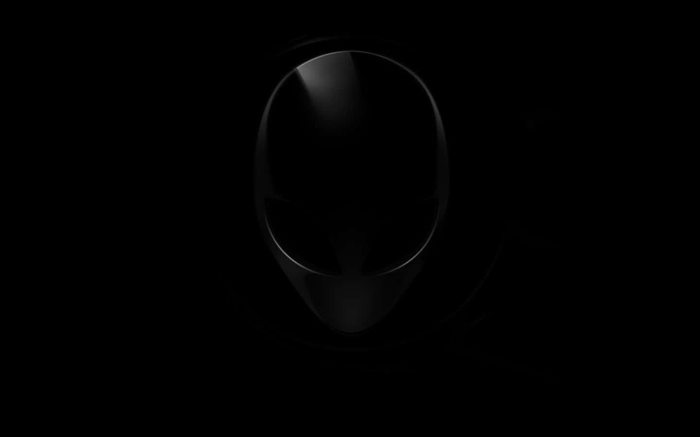 Cool Dark Desktop 桌布 壁紙 — 一個時尚的黑色外星人頭標誌，在漆黑背景上微妙地發光。