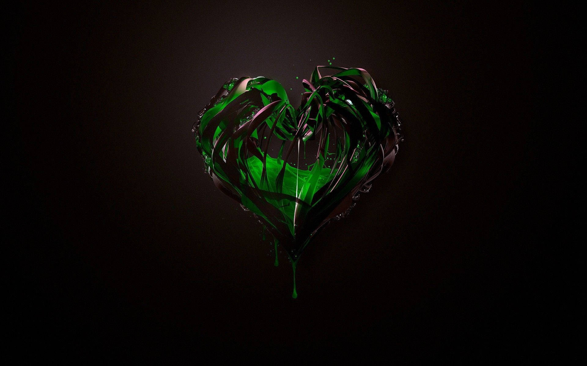 Green Heart 桌布 壁紙 — 一個有光澤的綠色液體心臟在深色背景上滴落，帶有反射高光。