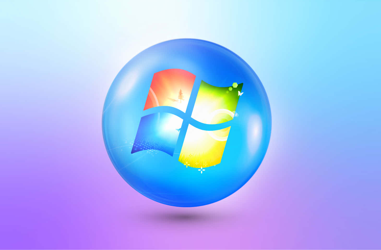 Windows 7 桌布 壁紙 — 一個有光澤的藍色球體包裹著Windows標誌，背景是漸變的天空。