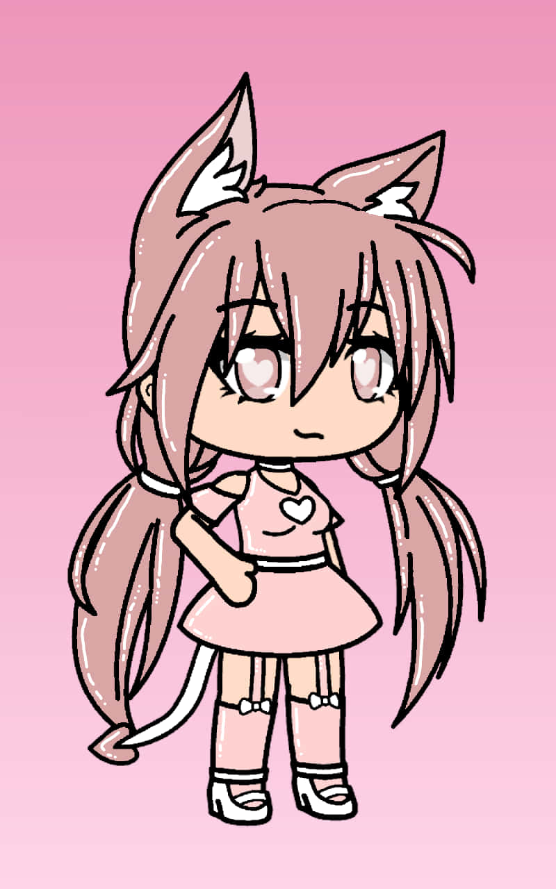 Gacha 桌布 壁紙 — 一個有粉紅色貓耳和尾巴的Q版動漫女孩，站在柔和的粉紅色漸變背景上，穿著相配的服裝。