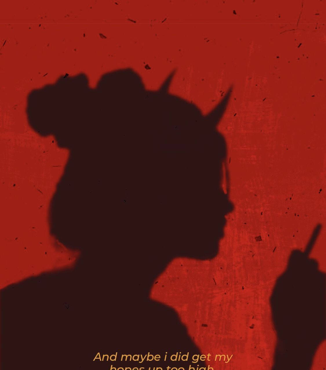 Sad Demon Girl 桌布 壁紙 — 一個有角且舉起手指的人的黑色剪影，背景為帶紋理的紅色背景並附有文字。