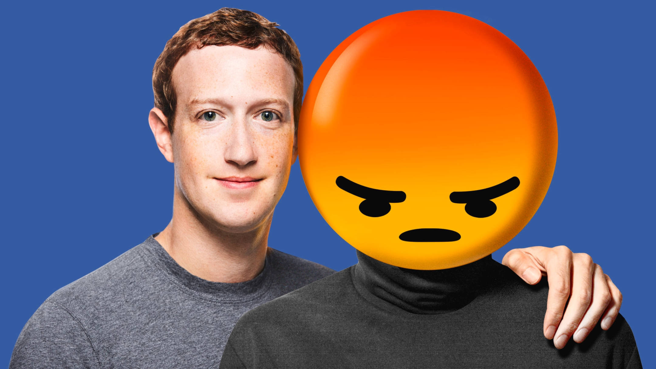 Zuckerberg 桌布 壁紙 — 一個有雀斑的男人微笑著站在另一個人旁邊，那個人的臉被一個憤怒的橙色表情符號取代，背景是純藍色。