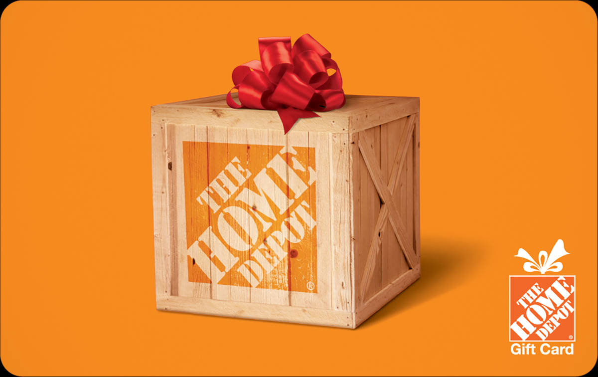 Home Depot 桌布 壁紙 — 一個木箱，上面有The Home Depot標誌和紅色蝴蝶結，背景為橙色。