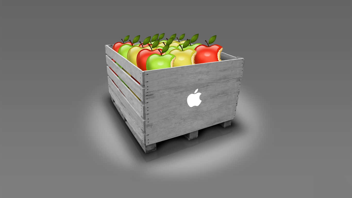 1366x768 Apple 桌布 壁紙 — 一個木箱裝滿色彩繽紛的蘋果，側面有一個發光的Apple標誌，背景為灰色。