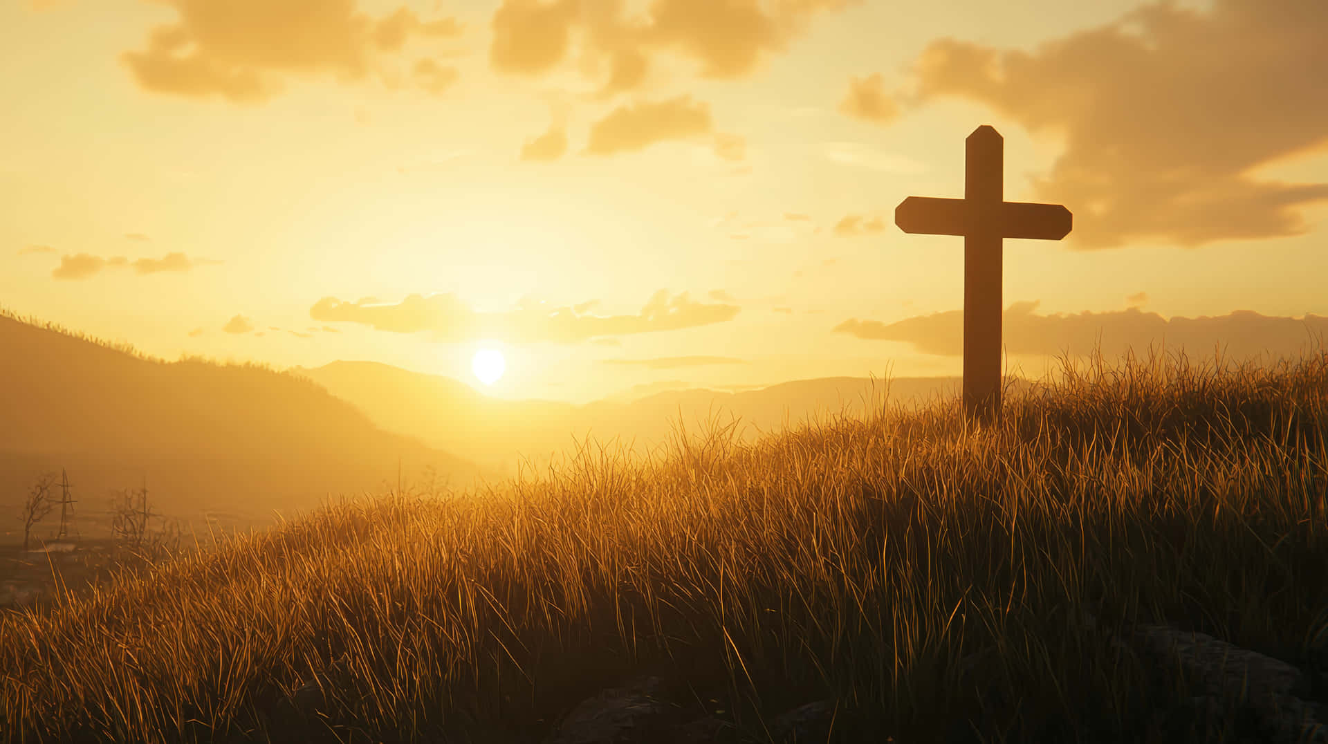 A wooden cross stands on a grassy hill, illuminated by a golden sunset with rolling mountains 壁紙 — 一個木製十字架在日落時分，金色光芒和遠山背景下，在長滿草的山丘上呈現剪影。