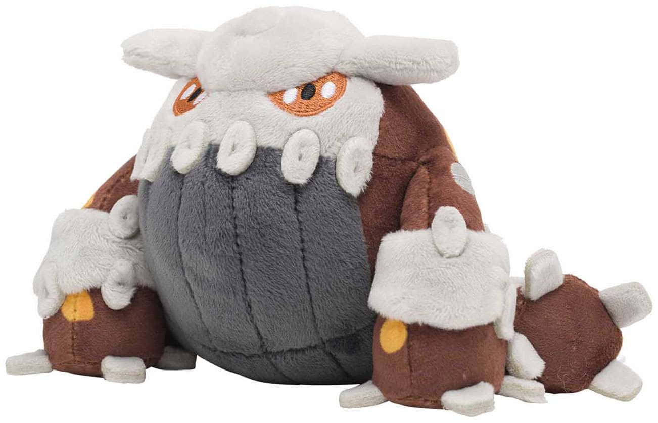 任天堂 桌布 壁紙 — 一個柔軟的 Pokémon Excadrill 毛絨玩具，有棕色和灰色的毛皮、白色爪子和橙色眼睛，直立坐著。