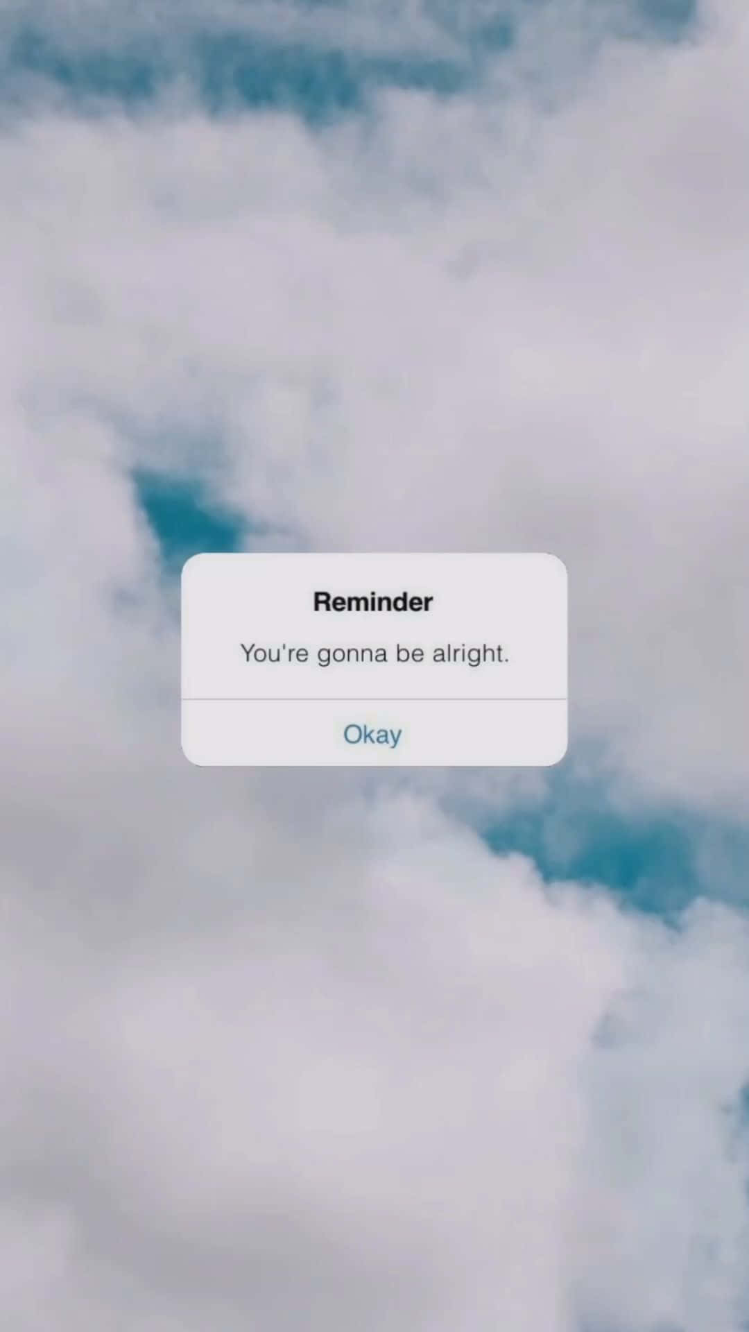 Aesthetic Reminder 桌布 壁紙 — 一個柔軟雲層滿佈的天空背景，有一個極簡風格的提醒彈出視窗，上面寫著「你會沒事的。」