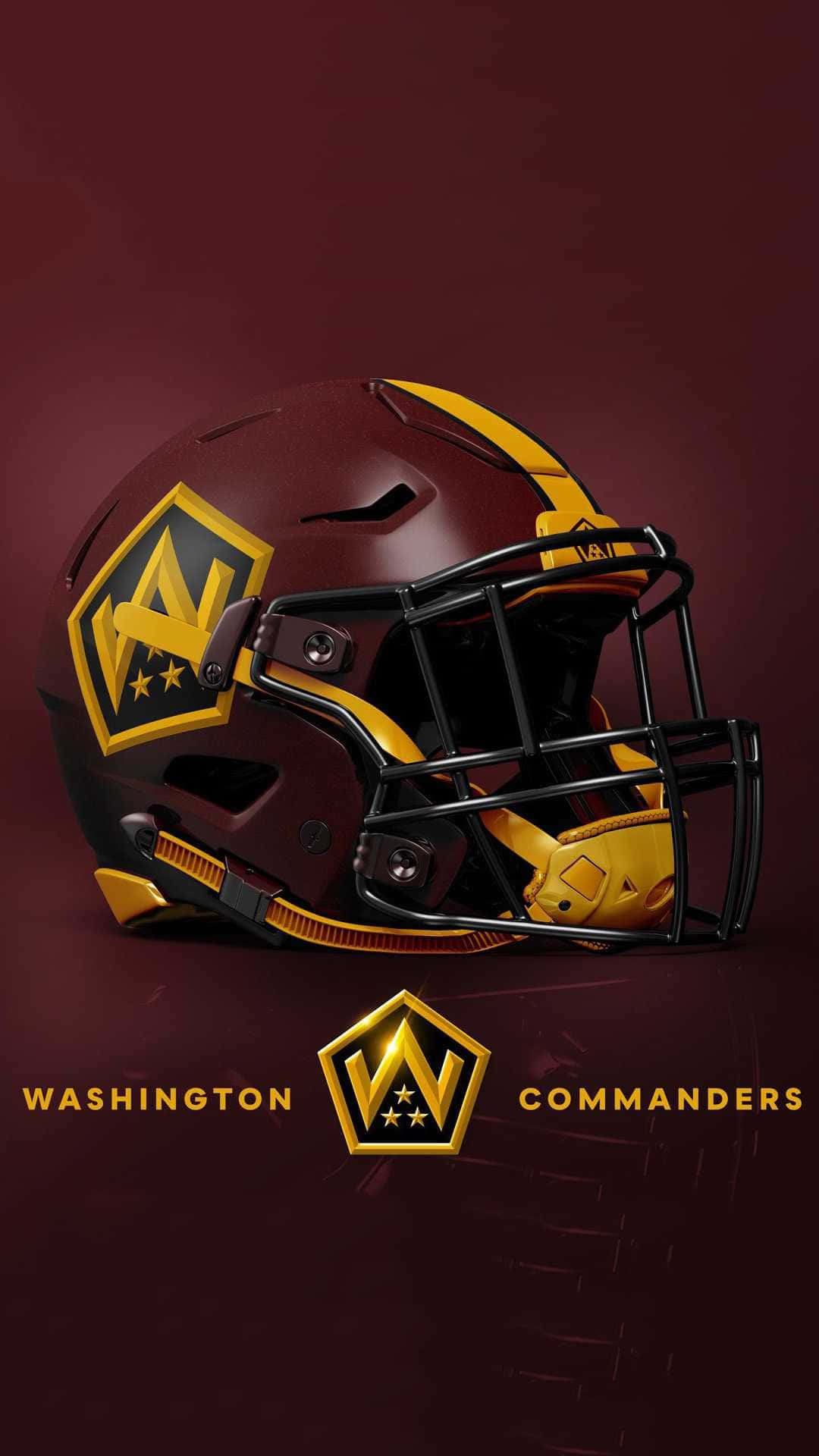 Washington Football 桌布 壁紙 — 一個栗色和金色的華盛頓指揮官美式足球頭盔，帶有黑色面罩，放置在深栗色背景上。