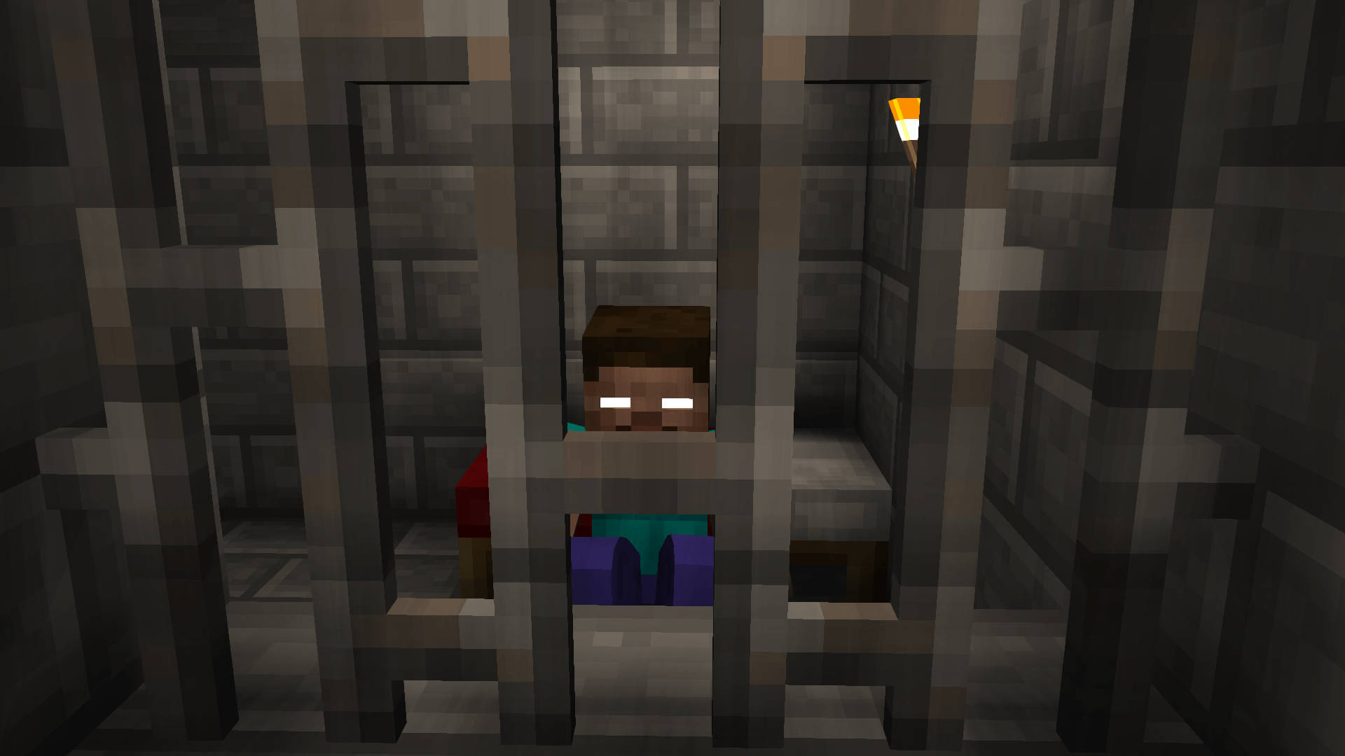 Herobrine 桌布 壁紙 — 一個棕色頭髮、眼睛發光的Minecraft角色坐在一個由單一火炬照亮的石頭監獄牢房裡。
