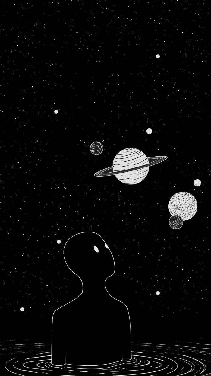 水中人物的剪影仰望行星和星星。 — Emo 美學 GIF 壁紙