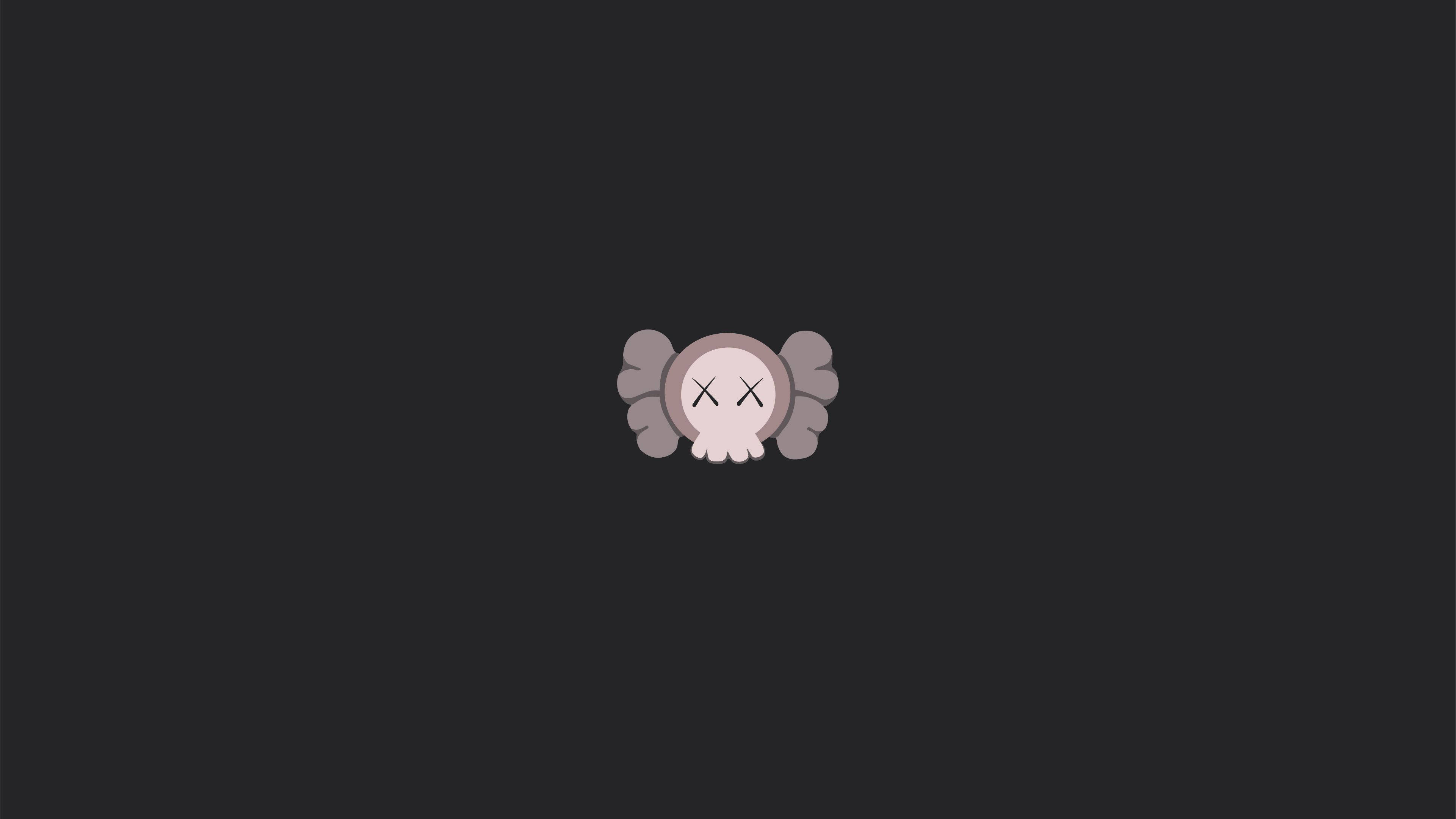 kaws pc 桌布 壁紙 — 一個極簡卡通骷髏頭，帶有X形眼睛和灰色翅膀，居中在深灰色背景上。